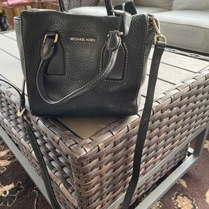 Michael Kor’s leather bag with crossbody strap